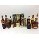 Fifteen mixed bottles to include: Glen Moray 12 Year Old Whisky, Tomintoul Glenlivet Single Highland