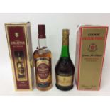 Singleton of Auchroisk 1978 single malt whiskey and bottle Cognac Chateau Paulet