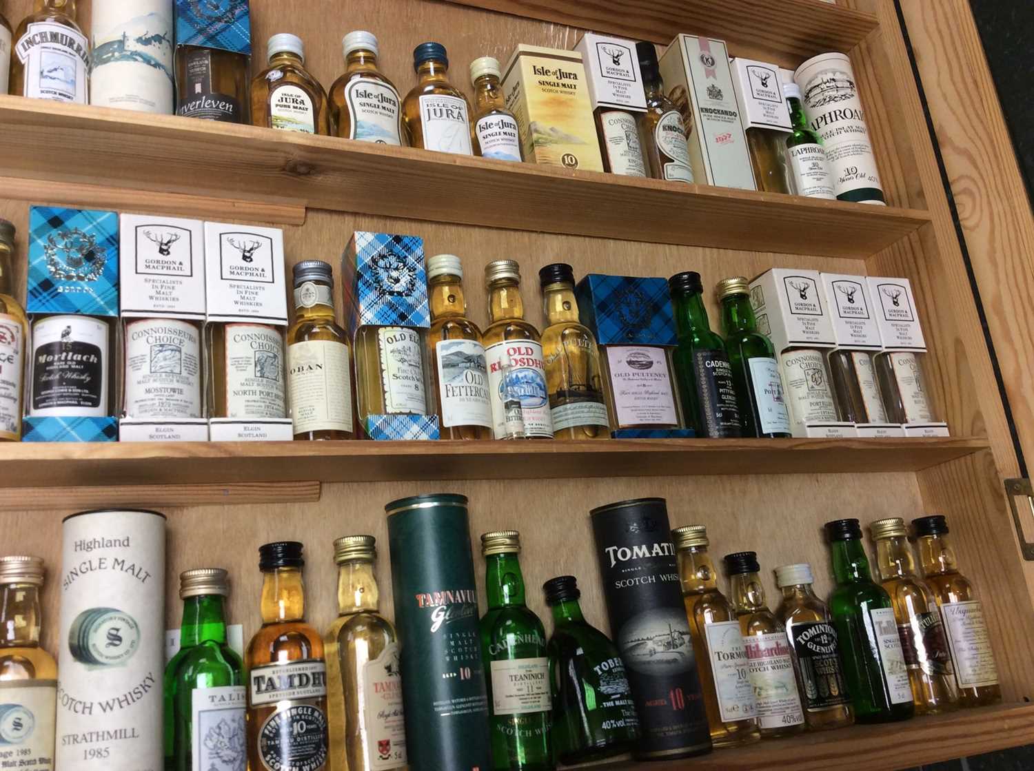 Fine collection of Scottish single malt whiskies in display cabinet, believed to represent all but t - Image 8 of 9