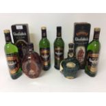 Whisky - six bottles, Glenfiddich 12 Years Old, two others in 'Clans of the Highlands' tin boxes, an