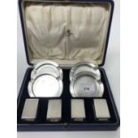 1930s Mappin & Webb silver smoking set comprising four engine turned circular ashtrays and four matc