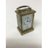 Early 20th century brass carriage clock with subsidiary alarm dial