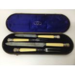 For the Christmas turkey: Victorian silver mounted, ivory handled carving set
