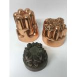 Three Victorian copper jelly moulds