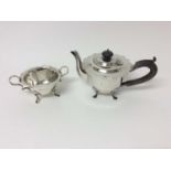 Silver teapot and matching two handled sugar bowl