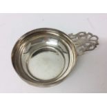 Late Victorian silver wine taster with pierced handle