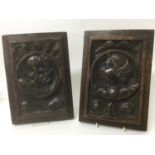 Pair of Tudor style carved walnut panels