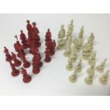 Fine 19th century carved and red stained ivory chess set