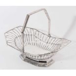 19th century silver plated cake basket of octagonal form with open wire frame and swing handle, rais