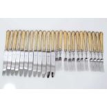 Twelve place setting Chippendale pattern fruit cutlery with silver gilt handles, (Sheffield 1977), A