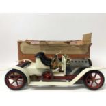 Vintage Mamod steam roadster car with white coach work and red wheels , complete with steering exten