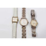 Ladies Ebel wristwatch together with a Hermes and an Omega watch