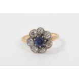 Antique sapphire and diamond cluster ring with a flower head cluster centred with a round mixed cut