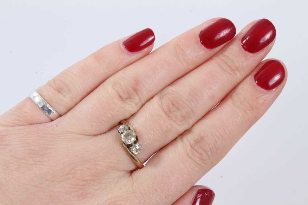 Diamond three stone ring with three old cut diamonds in cross-over claw setting on 9ct gold shank. E - Image 5 of 6