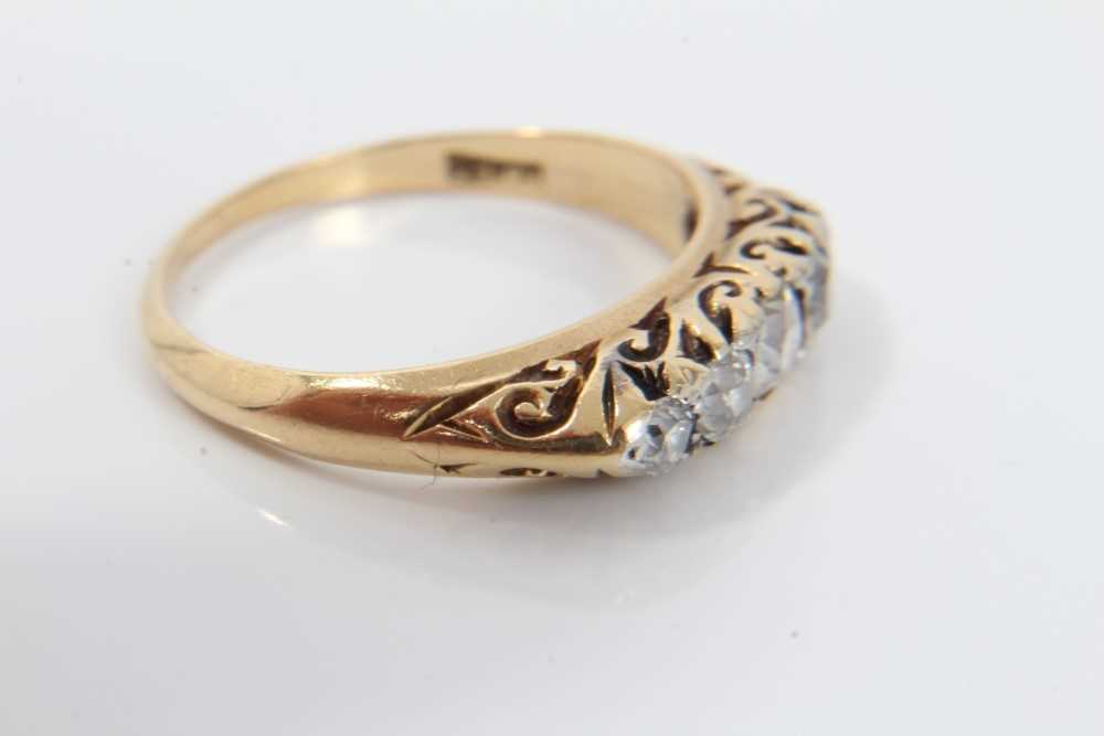 Late Victorian diamond five stone ring with five graduated old cut diamonds in carved gold claw sett - Image 4 of 6