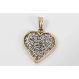 Heart shaped pendant set with single cut diamonds
