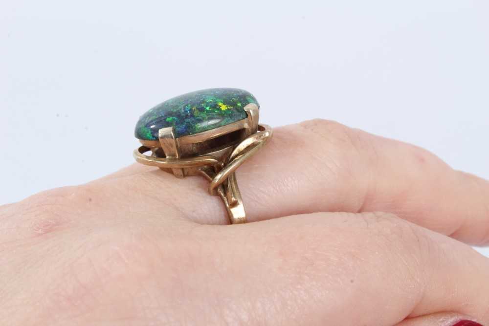 Black opal single stone ring with an oval black opal cabochon measuring approximately 20mm x 13mm x - Image 7 of 7
