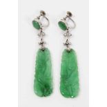 Pair of Chinese carved green jade pendant earrings, each with a carved and pierced jade plaque suspe