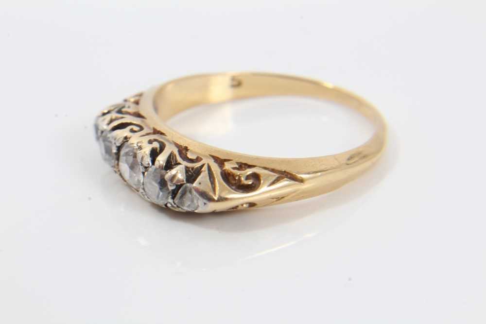 Late Victorian diamond five stone ring with five graduated old cut diamonds in carved gold claw sett - Image 2 of 6