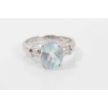Aquamarine single stone ring with an oval mixed cut aquamarine measuring approximately 10.05mm x 7.8