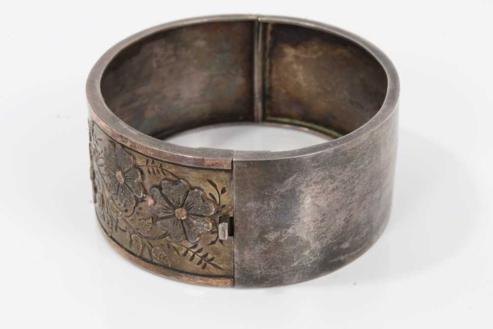 Two Victorian silver hinged bangles, one with applied and textured floral design, Birmingham 1883, t - Image 9 of 14