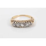 Late Victorian diamond five stone ring with five graduated old cut diamonds in carved gold claw sett