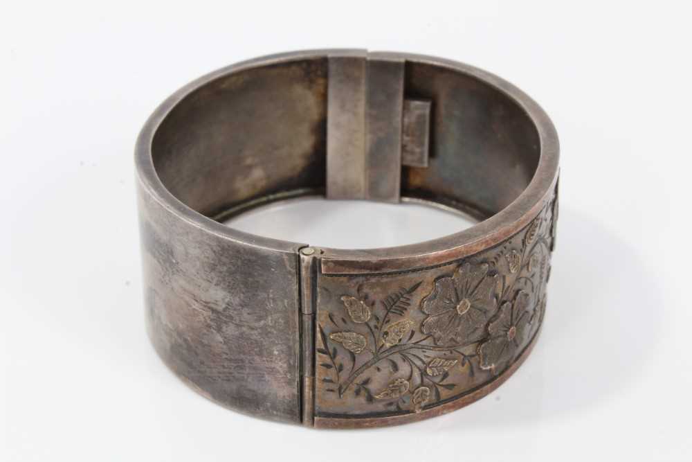 Two Victorian silver hinged bangles, one with applied and textured floral design, Birmingham 1883, t - Image 11 of 14