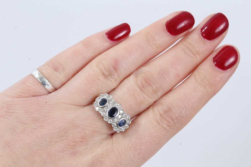 Sapphire and diamond triple cluster ring with three oval mixed cut blue sapphires surrounded by bril - Image 7 of 8