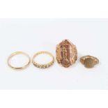 Four 9 ct gold rings including converted golfing fob, 14.6 grams gross