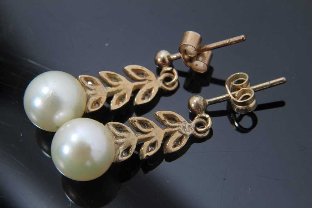 Pair of cultured pearl and diamond pendant earrings with a 7mm cultured pearl suspended from stylize - Image 2 of 2