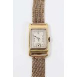 1930s gentlemans 18ct gold Omega retangular wristwatch with silvered dial on 9ct gold mesh bracelet
