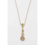 Edwardian 15ct gold peridot and seed pearl pendant on chain