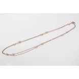 Edwardian Arts & Crafts gold and freshwater pearl 56 inch long guard chain