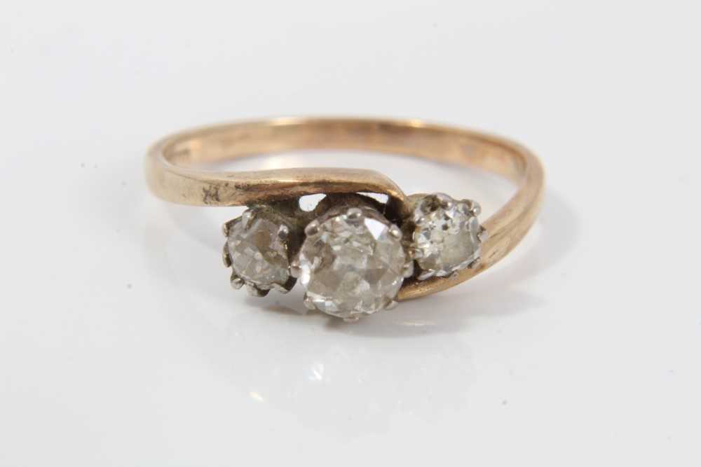 Diamond three stone ring with three old cut diamonds in cross-over claw setting on 9ct gold shank. E - Image 2 of 6