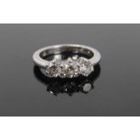 Diamond three stone ring with three round brilliant cut diamonds weighing approximately 1.00ct in to