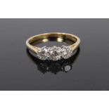Diamond three stone ring with three round brilliant cut diamonds estimated to weigh approximately 1.