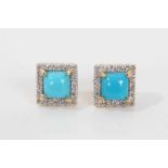 Pair of turquoise and diamond cluster earrings, each with a central square turquoise cabochon surrou