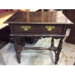 Carved oak side table with single draw