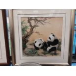 Two Oriental embroidered pictures including pandas