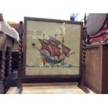 Oak fire screen with embroidered ship panel on barley twist supports, oak umbrella/stick stand and l