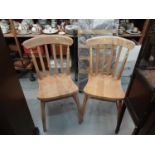 Five pine stick back chairs