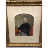 Three Victorian painted portrait photographs in glazed frames