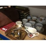 Collection of Royal Commemorative china, leather Gladstone bag, brass and enamel opera glasses, book
