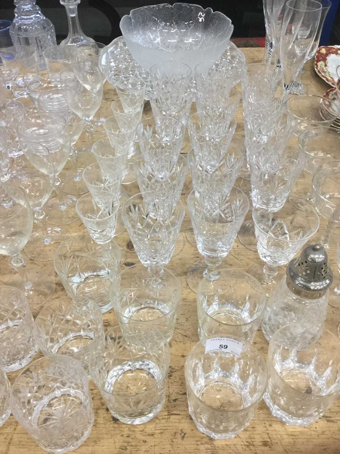 Group of assorted glassware to include cut glass decanters, wines, whisky glasses and others