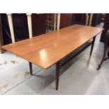 1970s G Plan teak coffee table with magazine rack under tier