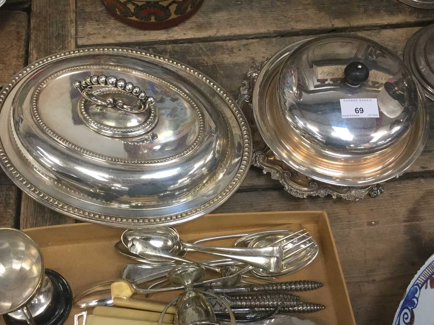 Silver plated muffin dish, plated entree dish, and other silver plated ware to include cutlery