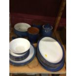 Blue Denby dinner ware including oval platters, storage jars, plates, egg cups and serving dish