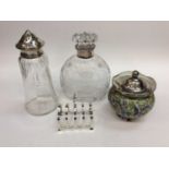 Silver toast rack, silver topped glass and silver topped preserve pot