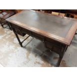 1930s Oak writing table with leather lined top, four drawers below on spiral twist supports