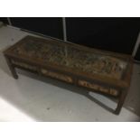 Chinese carved wooden coffee table with glazed top